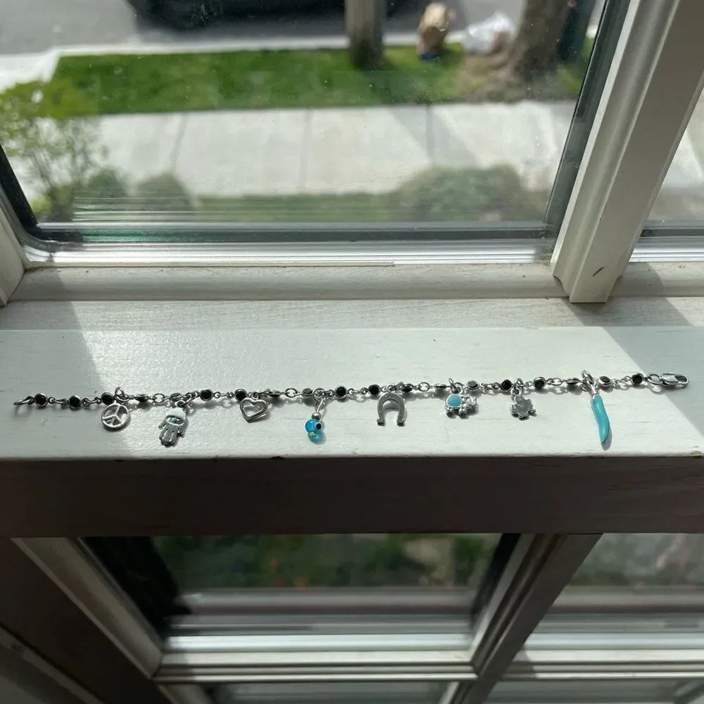 Cute silver bracelet with little charms